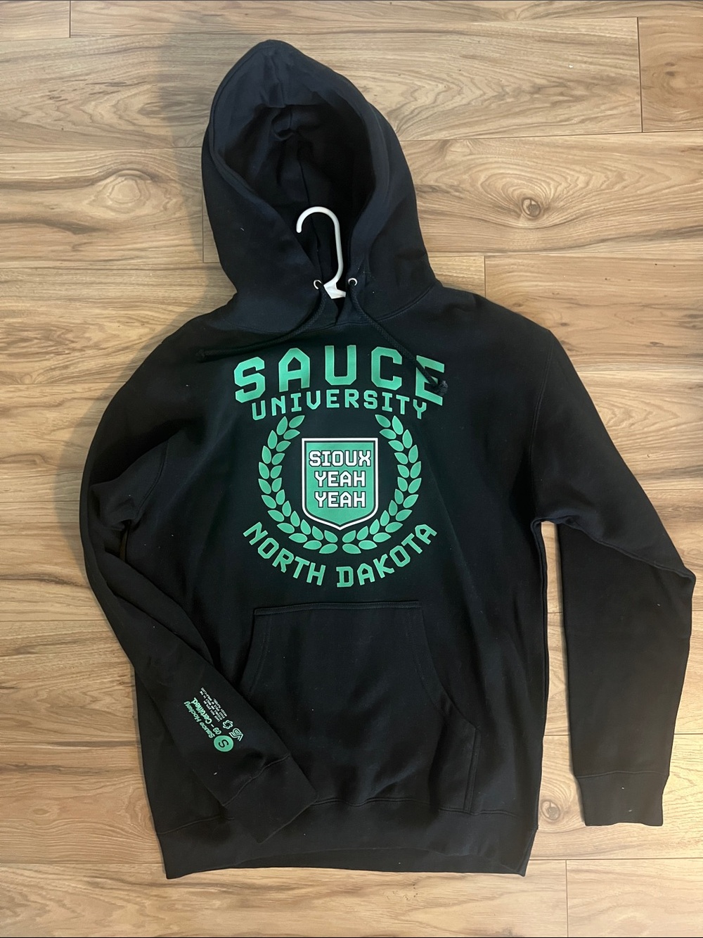 North Dakota Sauce University Hockey Black Hoodie with Green Crest